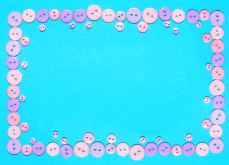 The banner is decorative. Blue background with colored sewing buttons in the form of a frame. The...