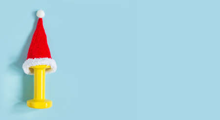 Exercise, fitness and developing the concept of a merry Christmas and a happy New year. Yellow...
