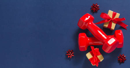 Exercise, fitness and development of the concept of a happy Christmas and a happy New year. Red...