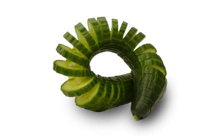 Decoratively arranged cucumber on a white backgroundの写真素材