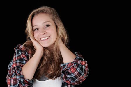 Closeup portrait of a charming young woman smiling の写真素材
