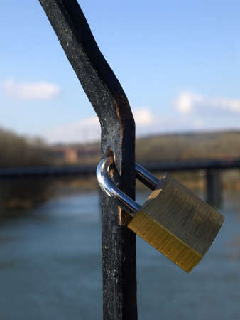 padlocks of love closed  in a bridgeの写真素材