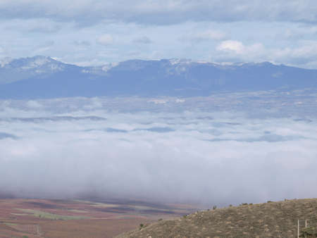 fog in a sunny day in the ebro valley in la riojaの写真素材