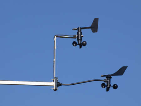 black small anemometer measuring wind