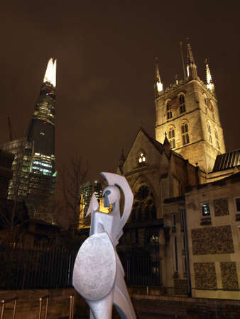 sculpture at night in the docks of londonの写真素材
