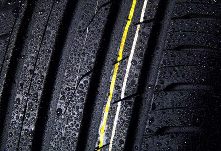 wet tire with asymmetric tread, detail close-upの写真素材