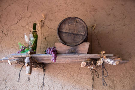 Barrel of wine, battle and glass as a decorotionの写真素材