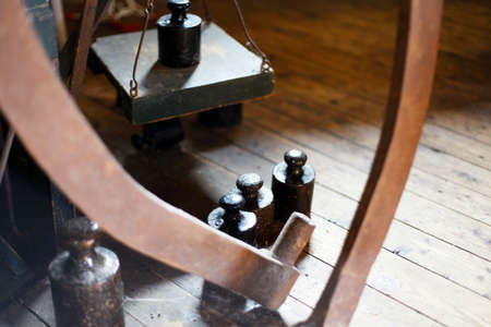 Old scale in an old windmillの写真素材
