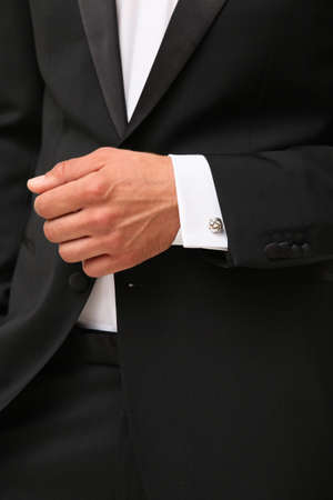Close-up man in black tuxedo and white shirt