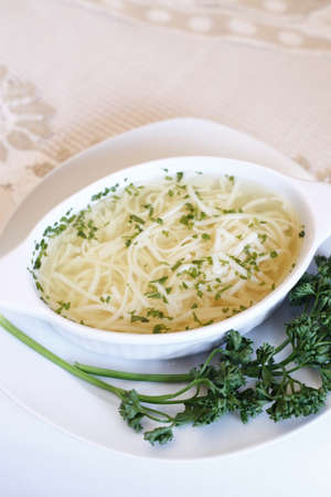 Delicious wedding soup in a white plate from above isolatedの写真素材