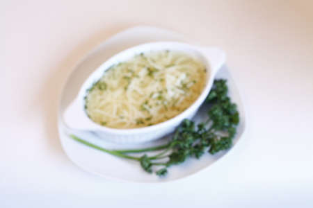 Delicious wedding soup in a white plate from above isolatedの写真素材