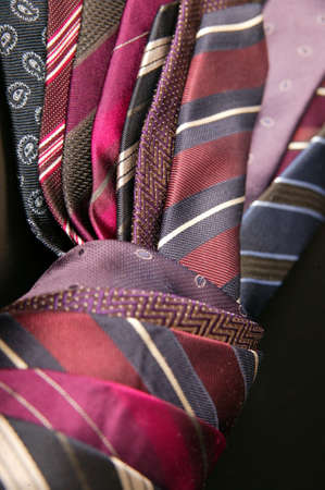 Colorful ties draped on tableの写真素材