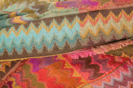 Still life of colorful scarves, draped on table, isolated neckerchief, Women Accessories