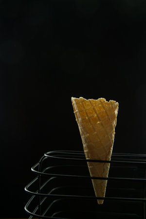 ice cream cone on a black background, close up