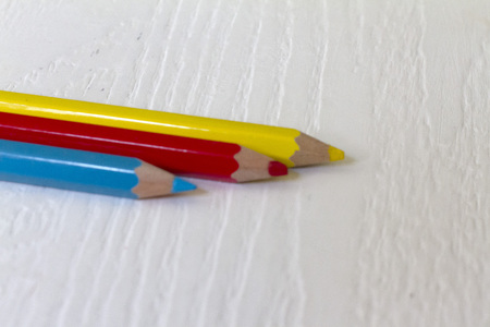 Wooden pencils with primary colorsの写真素材