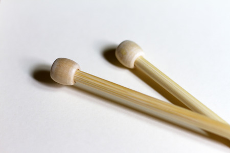 A pair of knitting needles made of woodの写真素材