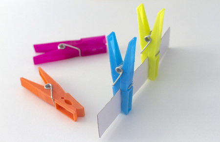 Cheerful and colorful clothespinsの写真素材