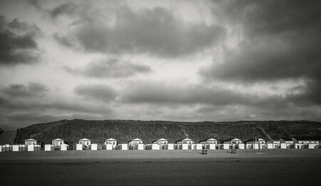 Small beach houses at North sea beach, black and whiteの写真素材