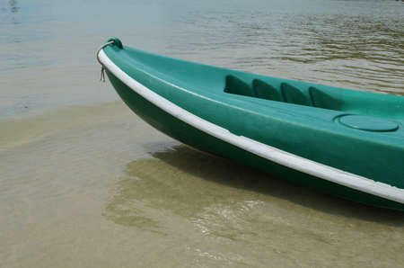 Canoes on the beach in Thailand の写真素材