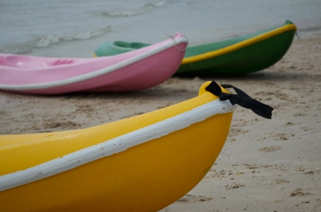 Canoes on the beach in Thailand の写真素材