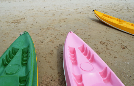 Canoes on the beach in Thailand の写真素材