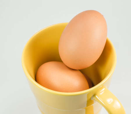 Images within an egg in a glass of coffee  の写真素材