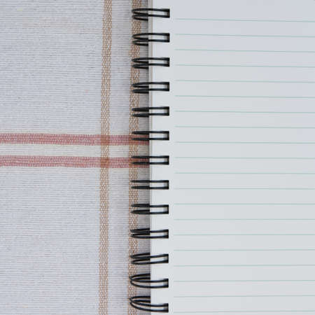 a spiral notebook.