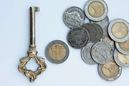 Key and coins.