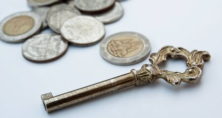 Key and coins.