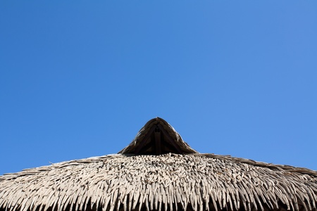 Thatched roof and blue sky in Thailand.の写真素材