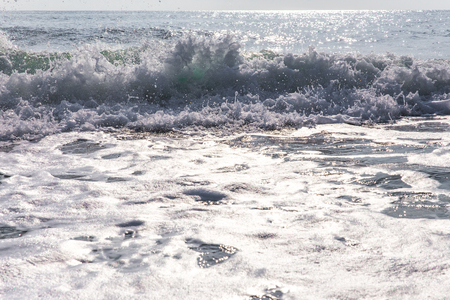 seawater with sea foam and wavesの写真素材