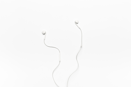 white Earphones isolated on white backgroundの写真素材