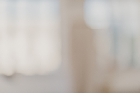 blurred bright room background with big windowの写真素材