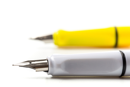 pair of modern fountain pen isolated on white, close upの写真素材