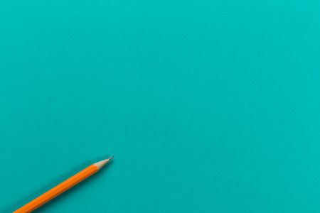wooden pencil on menthol background, top view