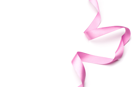 pink satin ribbon isolated on white backgrounの写真素材