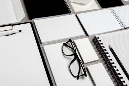 Flat lay composition with stationery on grey background. Mock up for designの写真素材