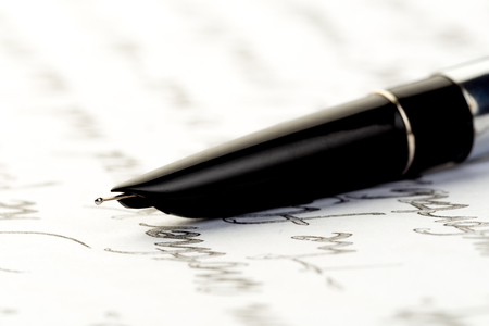 vintage fountain pen on letter