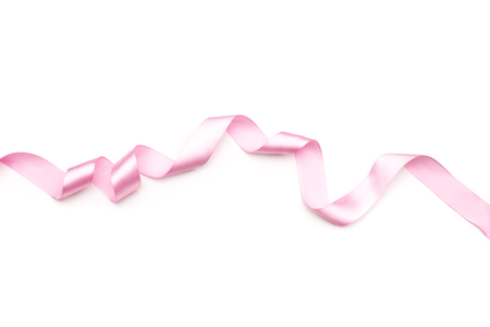 pink satin ribbon isolated on white backgrounの写真素材