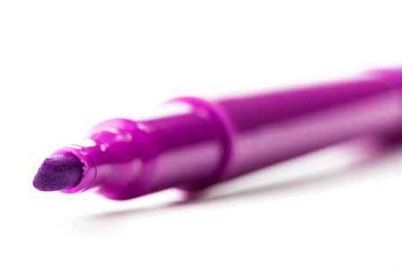 violet felt-tip pen isolated on white background, close up