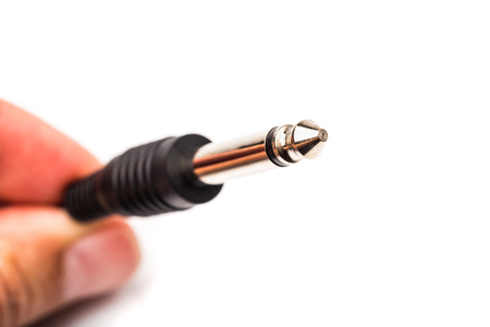 audio stereo synhro jack plug isolated over white backgroundの写真素材