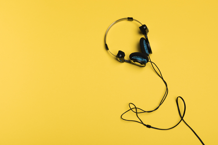 headphones on a yellow backgroundの写真素材
