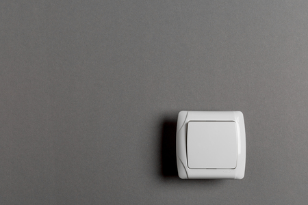 light switch on a gray wallの写真素材