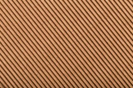 corrugated cardboard for packing. abstract background horizontal lines with wavy lines of beige colorの写真素材