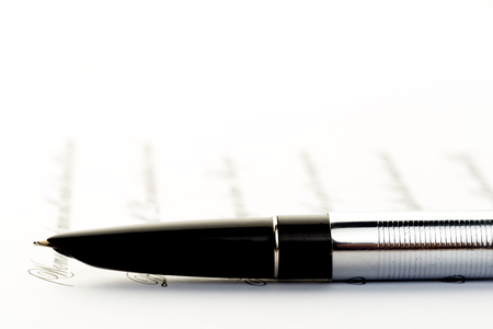 vintage fountain pen on letterの写真素材