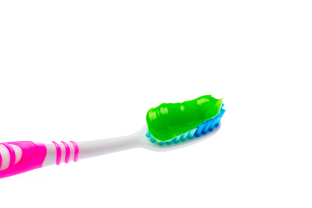 toothbrush and toothpaste on an isolated backgroundの写真素材