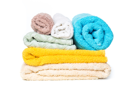 stack of towels isolated on white backgroundの写真素材