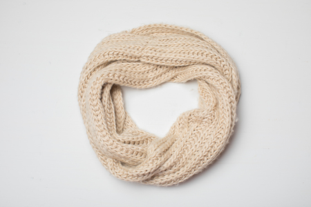 beige scarf onn white, top viewの写真素材