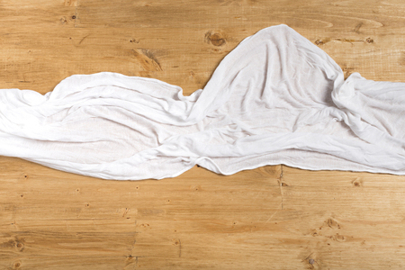 white towel on a wooden background with space for textの写真素材