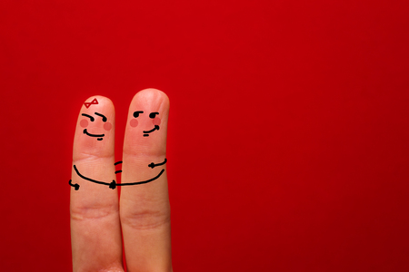Finger hug with Abstract Lights and painted smiley - Imageの写真素材